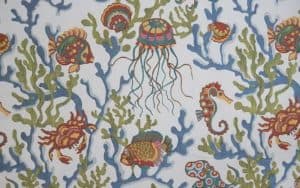 Photo of coastal fabric featuring colorful sealife 
