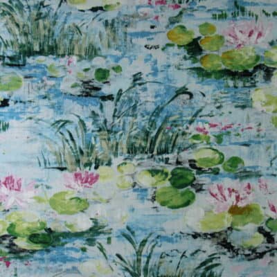 Covington Fabrics Monet 511 Dream Blue with serene water garden design in blues and greens with pink and gold accents printed on 100% cotton fabric.
