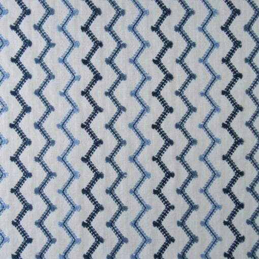 Covington Fabrics Rickrack 525 Porcelain Blue Embroidery with chevron design in shades of blue for light upholstery, drapery, bedding, cushions, pillows.