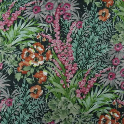 Trevi Fabrics Cosenza Forest with beautiful wildflowers in pink and orange and green foliage printed on 100% cotton fabric for upholstery drapery bedding.