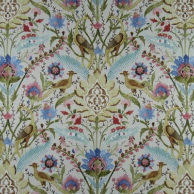Trevi Fabrics Goldfinch Multi with floral icon and bird design in gold green pink aqua blue on off white background printed on 100% cotton fabric.