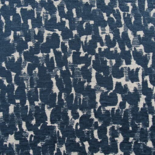 Trevi Fabrics Levity Indigo woven chenille upholstery fabric with contemporary faux skin design in blue for furniture upholstery, cushions, pillows.