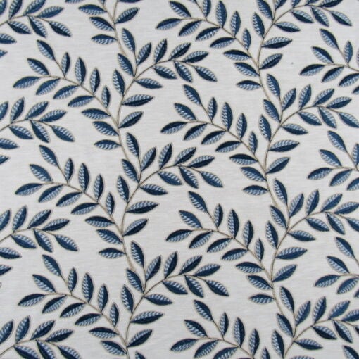 PKaufmann Embroidery Giardino Ink Blue botanical leaf design embroidery in navy and blue on off white background. Giardino Ink Blue can be used for drapery, bedding, upholstery, accent pillows, cushions, headboards and more.