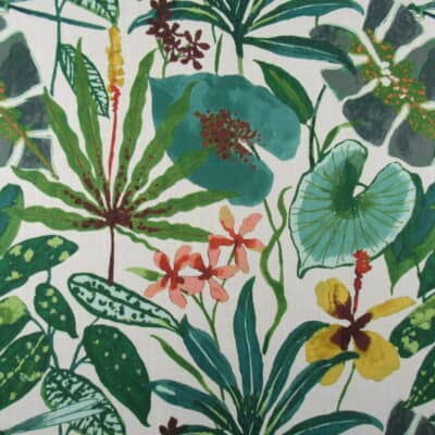 Swavelle Fabrics 104 Degrees Tropical with large scale tropical design in shades of green and gold coral accents, digital print on 100% polyester fabric.