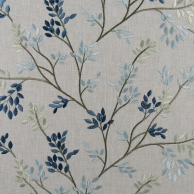 Mill Creek Embroidery Story Teller Dragonfly with linen look background and aqua navy blue botanical leaves embroidery fabric.