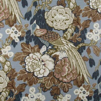 Richloom Fabrics Byron Classic bird and floral design with blue background and navy, blush, light brown accents printed on 100% cotton fabric.