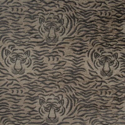 PKaufmann Fabrics Copycat Nutmeg features a tiger face design in brown and black. Crafted from durable polyester chenille, it is ideal for furniture upholstery, cushions, pillows, headboards. Available on sale!