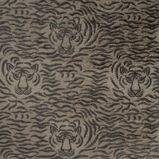PKaufmann Fabrics Copycat Nutmeg features a tiger face design in brown and black. Crafted from durable polyester chenille, it is ideal for furniture upholstery, cushions, pillows, headboards. Available on sale!