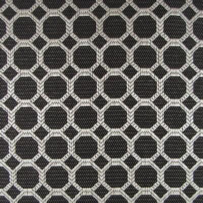 Regal Fabrics Dax Black features a hexagon pattern, woven with 100% polyester for a durable upholstery fabric. It showcases a black background with beige accents, making it ideal for furniture upholstery, pillows, and cushions.