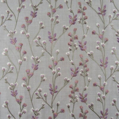 Mill Creek Embroidery Peacekeeper Wisteria embroidery fabric features a floral vine design with lavender, coral, white flowers and taupe background.