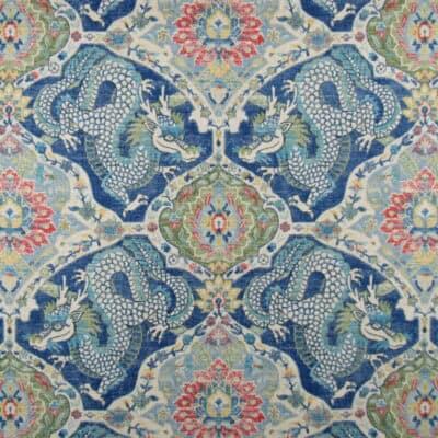 Covington Fabrics Falkor 511 Dream Blue features an Asian dragon design, symbolizing good fortune, printed on durable 100% cotton multipurpose fabric.
