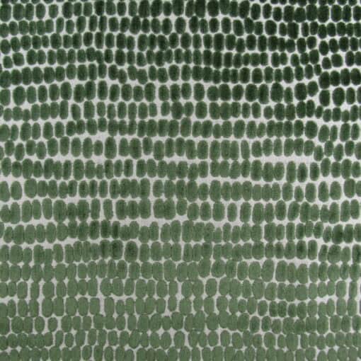 Trevi Fabrics River Stones Emerald Velvet features a contemporary dot design in green, high-end cut velvet for upholstery, cushions, and pillows.