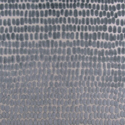 Trevi Fabrics River Stones Spa Velvet features a contemporary dot design in teal, high-end cut velvet for upholstery, cushions, and pillows.