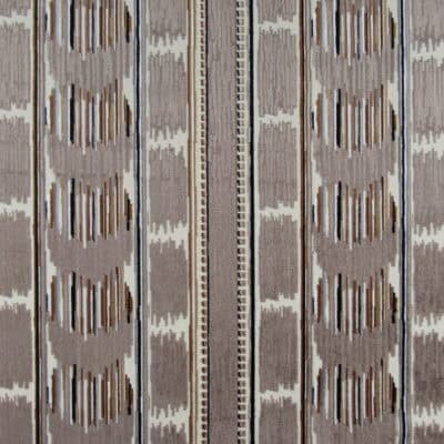 Velvet Ikat Stripe Woodland showcases a luxurious velvet ikat stripe in taupe, accented with black and gold, offering a soft and comfortable texture perfect for upholstery, pillows, or cushions.